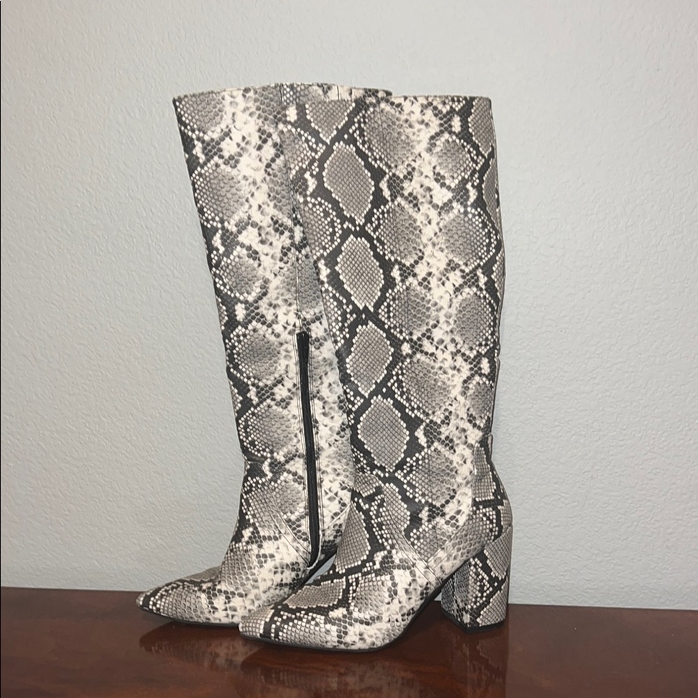 Bold Black and White Heeled Boots with Chunky Heel